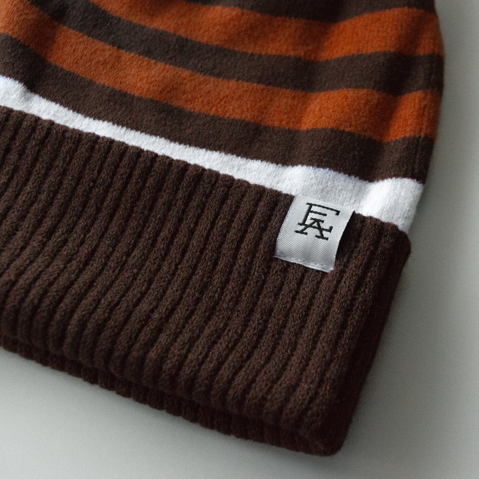 Cleveland Team Stripe Pom Beanie